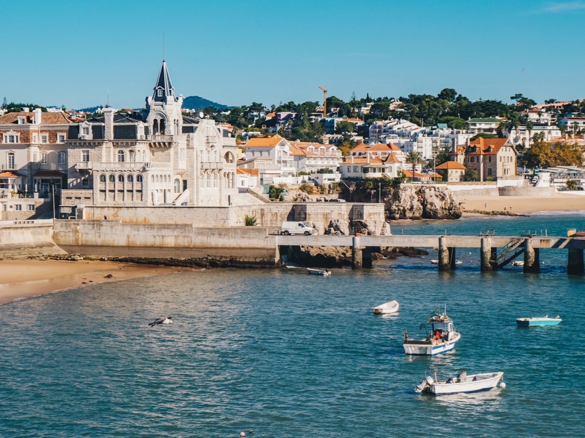 Cascais bay, the fishing pier and the hillside town