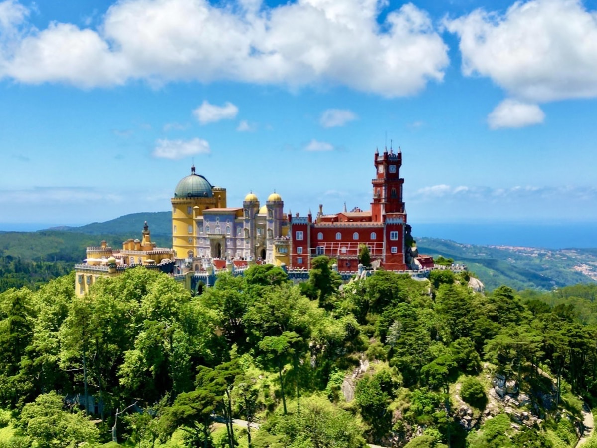 The Pena Palace above the forested hills of Sintra